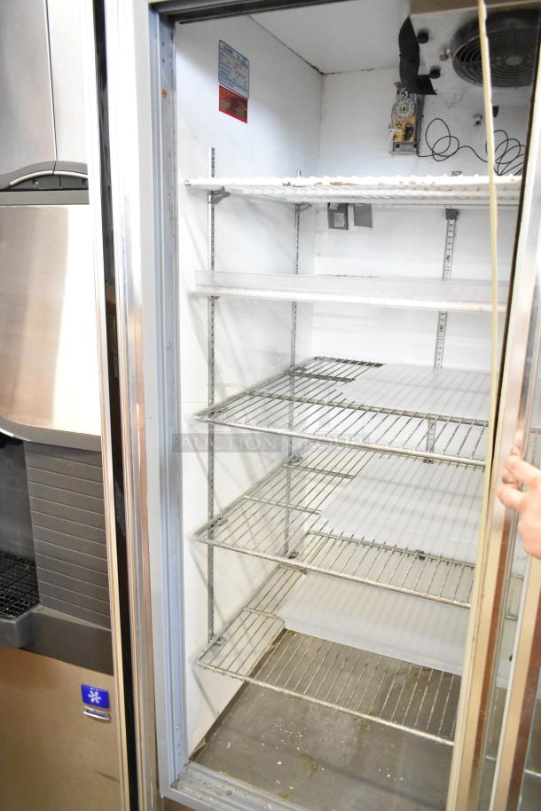 Leader Commercial 2 Door Reach-In Cooler Merchandiser, 115 volts, 1 phase, with multiple wire shelves, visible wear.
