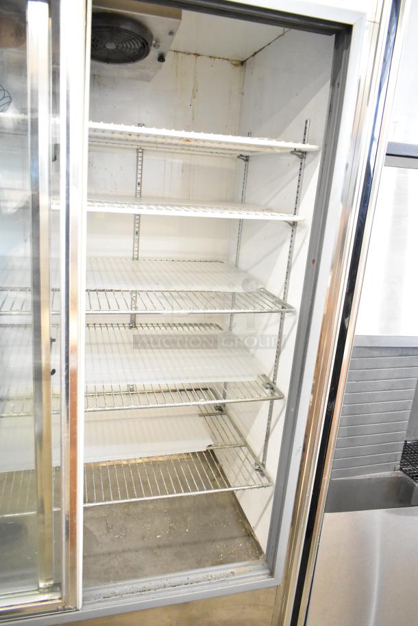 Leader Commercial 2 Door Reach In Cooler Merchandiser, 115 volts, 1 phase, shelves intact, slight wear, stainless steel frame.