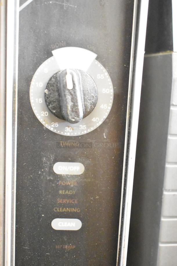Groen HyPer Steam 2 Deck Steam Cabinet control panel, shows timing dial, on/off button, and status indicators.