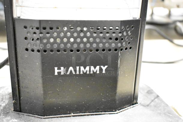 Haimmy UEH520 infrared electric heater, black with perforated design, visible logo. Condition: used. 120 Volts, 1 Phase.