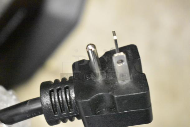 Close-up of a black power plug for the 2025 Avantco 177SAL17M Commercial 17" Electric Salamander, 208/240 Volts.