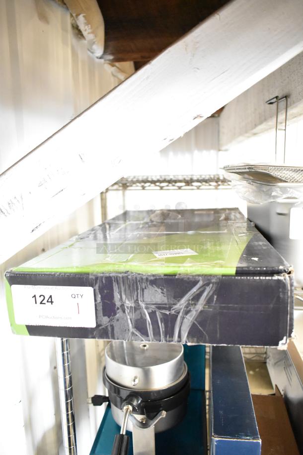 Box of Regency 600PRD8X pre-rinse faucet, brand new, scratch and dent, 8" centers, 44" hose, 1.15 GPM. Label: Lot 124.