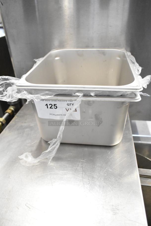 Brand new Vigor 1/2 Size 6" Deep Anti-Jam Stainless Steel Steam Table Pan, 22 Gauge, with sediment tray and labeling.
