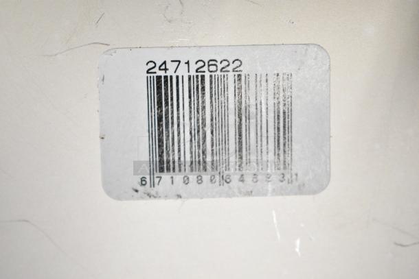 Barcode label with number 24712622 on a scratch and dent item; includes Vigor anti-jam stainless steel pan.