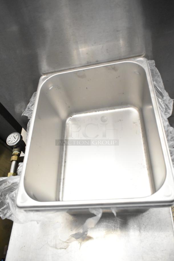 Vigor 1/2 Size 6" Deep Anti-Jam Stainless Steel Steam Table Pan, 22 Gauge, new, visible scratches and dents.