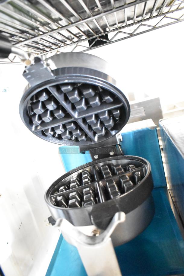 Brand new Carnival King 382WBM13 non-stick Belgian waffle maker with timer, 120V, 1 phase, scratch and dent condition.