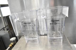 2 Brand New Blendtec FourSide 40-611-60 75 oz. clear frothing jars, no lids, with visible measurement markings.