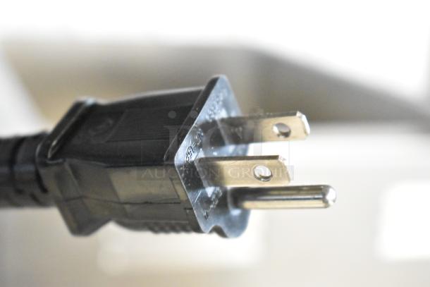 Close-up of a plug from the Avantco 177W43 electric countertop food warmer, 120 volts, 1 phase, new condition.