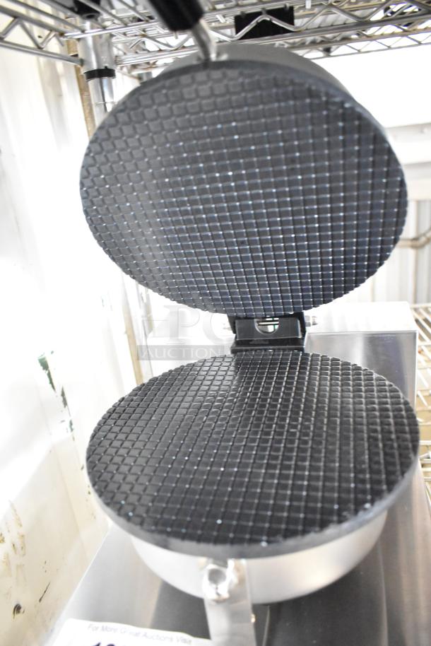 Brand new Carnival King 382WCM1 8" waffle cone maker, non-stick, 120 volts, 1 phase. Scratch and dent condition.