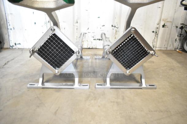 Two brand new Garde heavy-duty French fry cutters, models FC14 and FC38, showing sturdy metal grid plates.