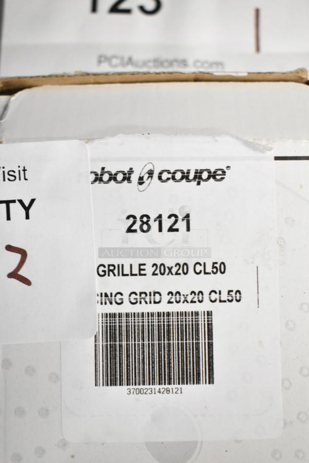 Robot Coupe 28121 dicing grid packaging, labeled 20x20 CL50, new condition. Barcode and brand visible.
