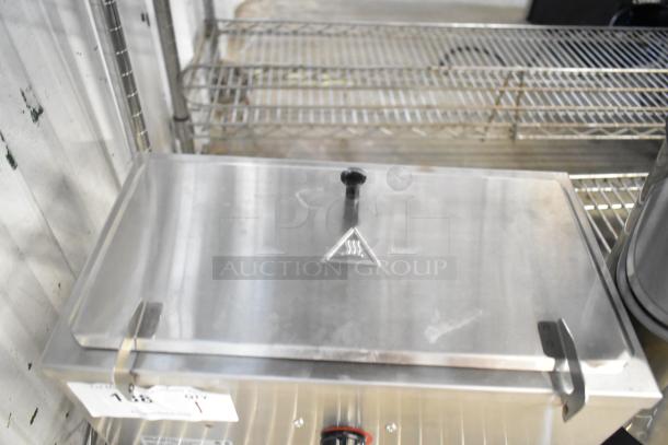 Brand new Carnival King 382CDPW2 3 Qt. Double Cone Dip Warmer, stainless steel, 120 volts, minor scratches visible.