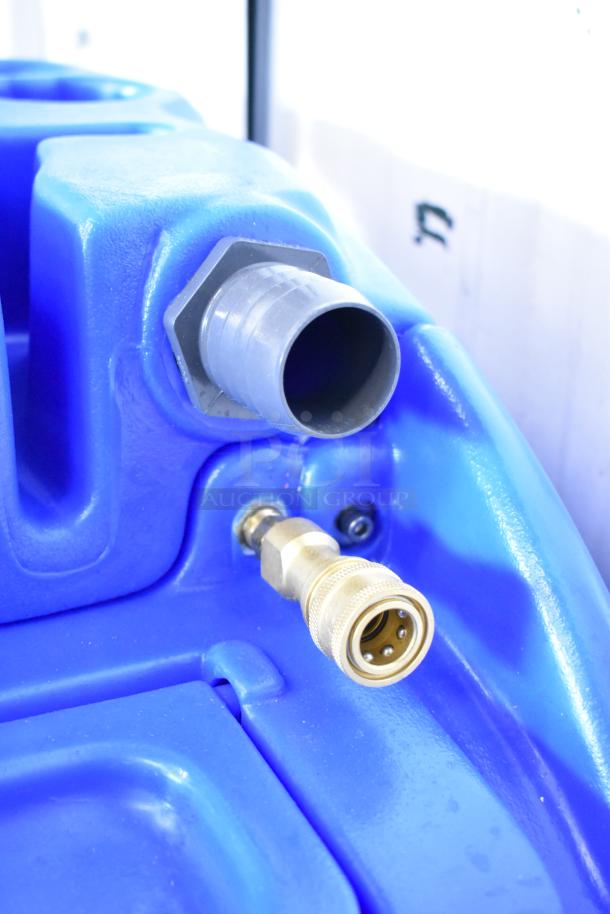 Lavex Dual 3-Stage Carpet Extractor, blue casing, hose connector, 12-gallon capacity, new condition despite scratches or dents.