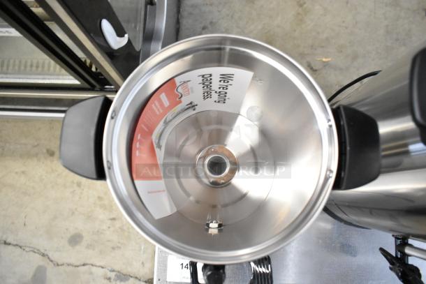 Stainless steel interior of Avantco CU45ETL coffee urn, showing new condition and paperless label inside.