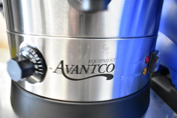 Stainless steel Avantco coffee urn with brand logo, heating, and keep warm indicators visible.