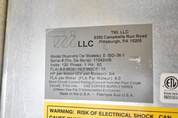 TMI E-IBD-36-1 air curtain label, model details, 120 volts, 1 phase, warning of electrical shock risk.