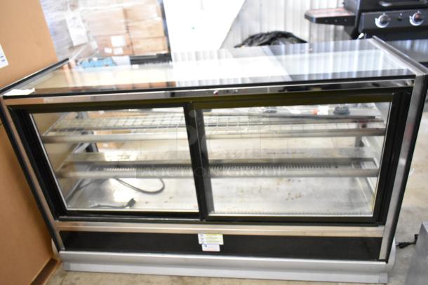 Vollrath HDE8460 heated display case, commercial floor style, glass front, shelving, 120V, 1 phase, clean condition.