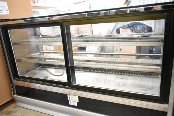 Vollrath HDE8460 heated display case, 120 volts, with glass sliding doors and metal shelves, commercial condition.
