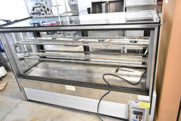Vollrath HDE8460 heated display case, 120V, 1 phase, floor style, shelves visible, slight wear, commercial use.