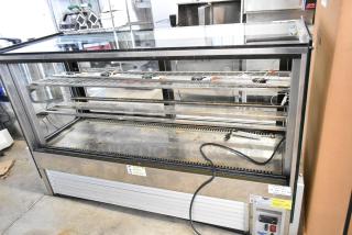 Vollrath HDE8460 heated display case, 120V, 1 phase, floor style, shelves visible, slight wear, commercial use.