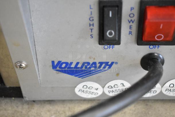 Vollrath HDE8460 heated display case control panel with power and light switches, QC passed stickers visible.