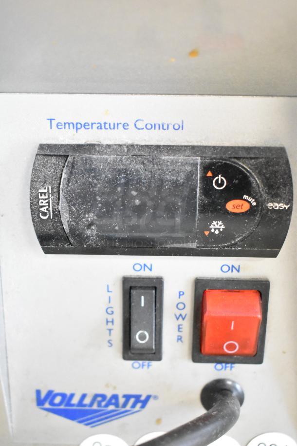 Vollrath HDE8460 heated display case controls with temperature settings, power, and lights switches. Brand logo visible.