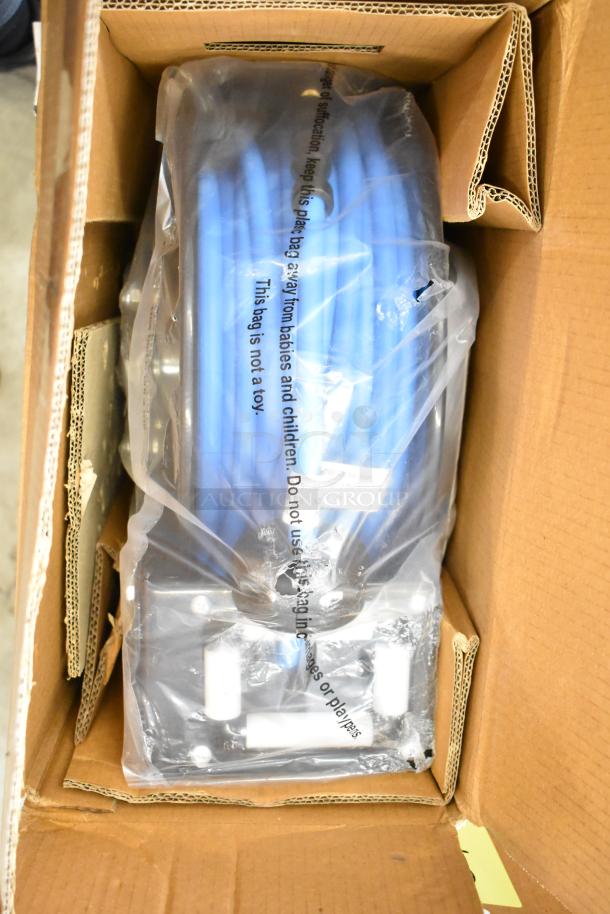 Brand new Regency open powder-coated steel air hose reel with 50' x 1/4" hose, model 600HRPC1450, in box.