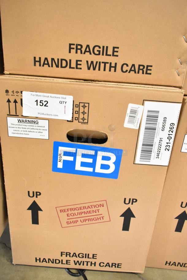 Cardboard box for 2024 Crathco 231-01269 beverage machine, labeled "FRAGILE" and "HANDLE WITH CARE." Shipping arrows visible.