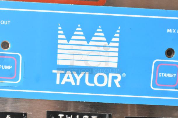 Taylor 8757-33 commercial soft serve machine control panel, blue with logo and standby button, 2 flavor twist model.