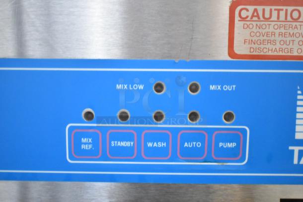 Alt text: Control panel of Taylor 8757-33 soft serve machine showing buttons for mix ref, standby, wash, auto, and pump.