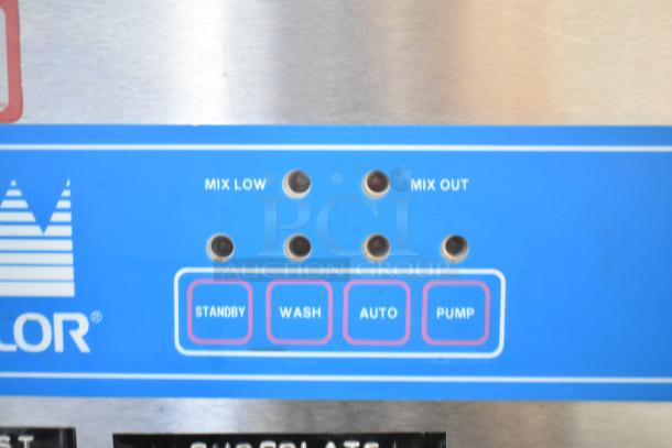 Taylor 8757-33 commercial soft serve machine controls. Features mix low, mix out, standby, wash, auto, pump buttons.
