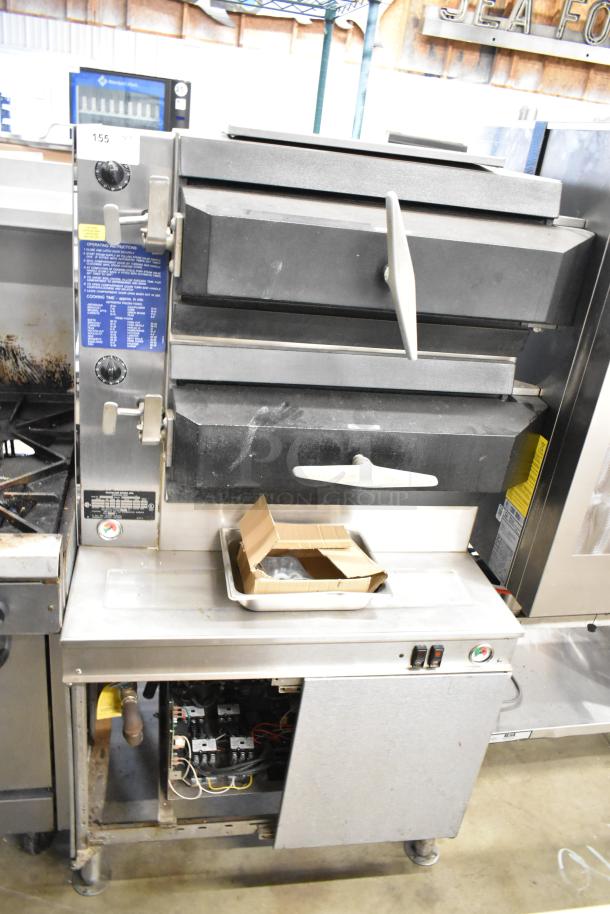 Cleveland Commercial 2 Deck Pressure Steam Cabinet with visible controls and open cabinet, used condition.