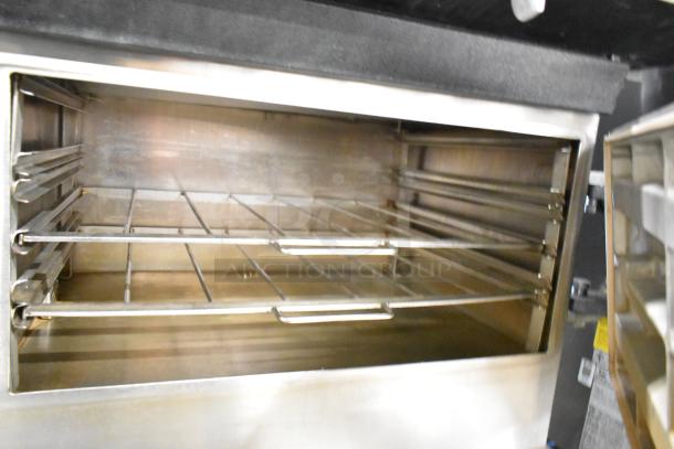 Cleveland Commercial 2 Deck Pressure Steam Cabinet with stainless steel interior, showing spacious racks. Clean condition.