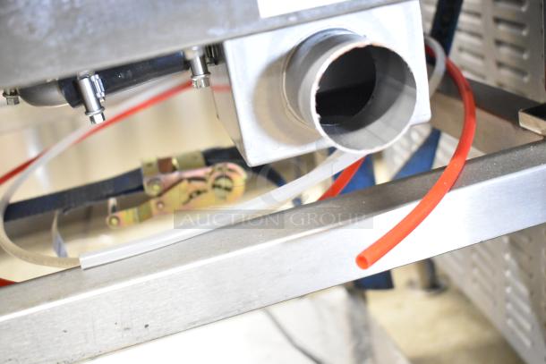 Close-up of part of a BKI AETG101R stainless steel combi convection oven. Visible piping and metal components indicate new condition, despite minor scratches.