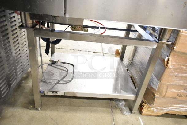 BKI AETG101R stainless steel combi convection oven on equipment stand, natural gas, brand new with scratches and dents.