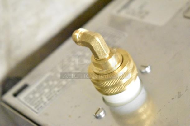 Close-up of a brass fitting on a 2025 Bunn WAVE15-S-APS SmartWave® Coffee Brewer. Scratch and dent condition.
