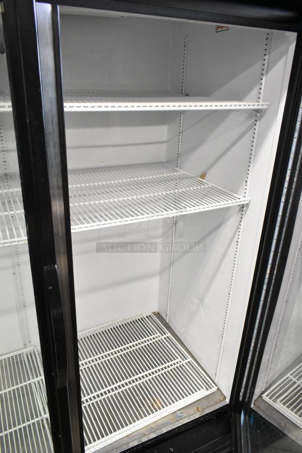 2020 True GDM-49-HC commercial cooler, 2 glass doors, adjustable shelves, 115V, 1 phase, good condition, spacious interior.