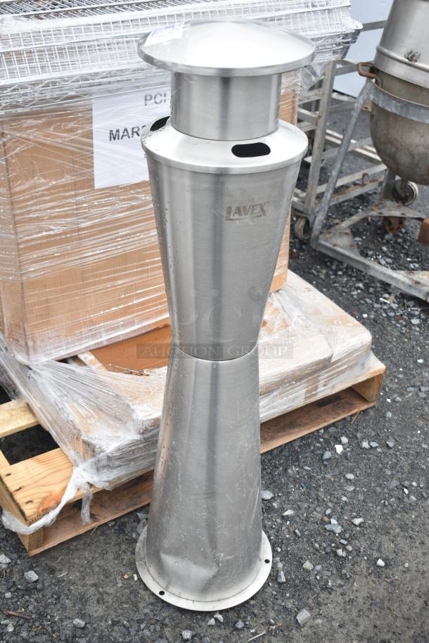 Brand new Lavex 475sp2rdss 2-gallon stainless steel freestanding cigarette receptacle with minor scratches.