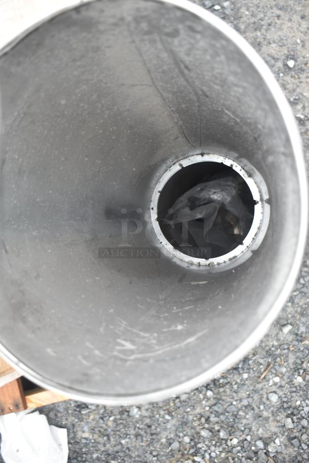 Brand new Lavex 475sp2rdss 2-gallon stainless steel cigarette receptacle with minor scratches, visible dent. Freestanding model.