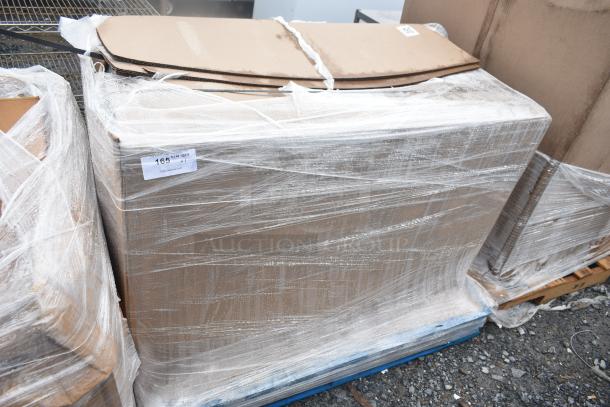 Brand new scratch and dent unit wrapped in plastic, on a blue pallet. Label shows "165 MIN QTY X 1."