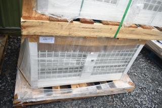 Brand new 35352944C052 security case, floor model with grid, minor scratch and dent, on wooden pallet, wrapped in plastic.
