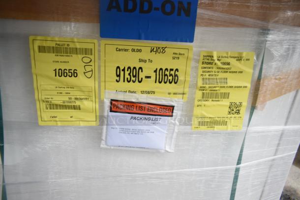 Brand new security case floor with grid, model 35352944C052, labeled for store 10656. Packing list enclosed.