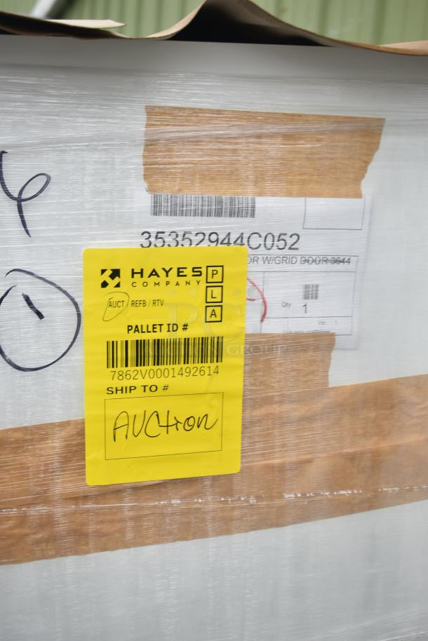 Brand new scratch and dent security case, model 35352944C052, with grid. Yellow Hayes Company label visible.