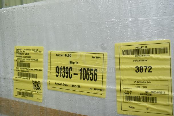 Brand new security case floor, model 35352944C052, with grid. Minor scratches and dents. Labels detail shipment info.