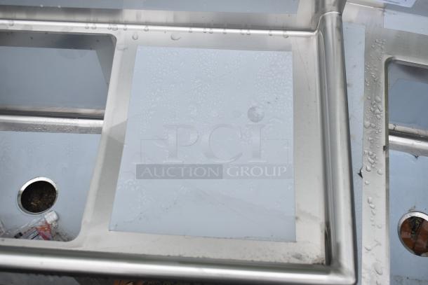 BRAND NEW SCRATCH AND DENT! Regency 600S31818218, 94" three compartment stainless steel sink with cross bracing and drainboards, no legs.