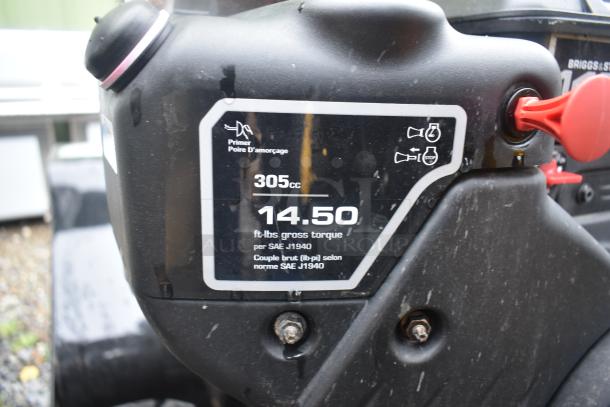 Briggs & Stratton Murray 1695720 Snow Thrower, 305cc, 14.50 ft-lbs gross torque, visible engine details, good condition.