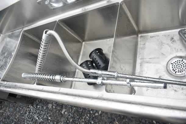 Commercial 3 bay sink with dual drain boards, stainless steel, includes pre-rinse faucet. Good condition.