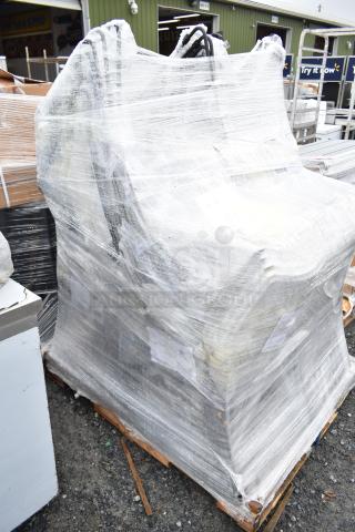 Pallet of 25 new scratch and dent items wrapped in plastic, includes chairs. Auction lot offers 25 times your bid potential.