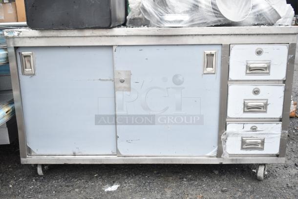 Regency 600EBT3060 stainless steel table, 30"x60", enclosed base, open front, adjustable midshelf, type 304, visible wear.