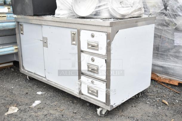 Regency 600EBT3060 stainless steel table, 30"x60", enclosed base, open front, adjustable midshelf, used condition.